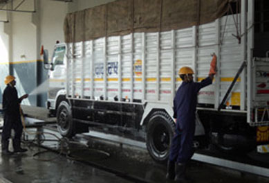 Pickup truck receiving wash in a Tata Motors Service Station